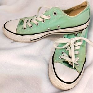 Mint green converse shoes